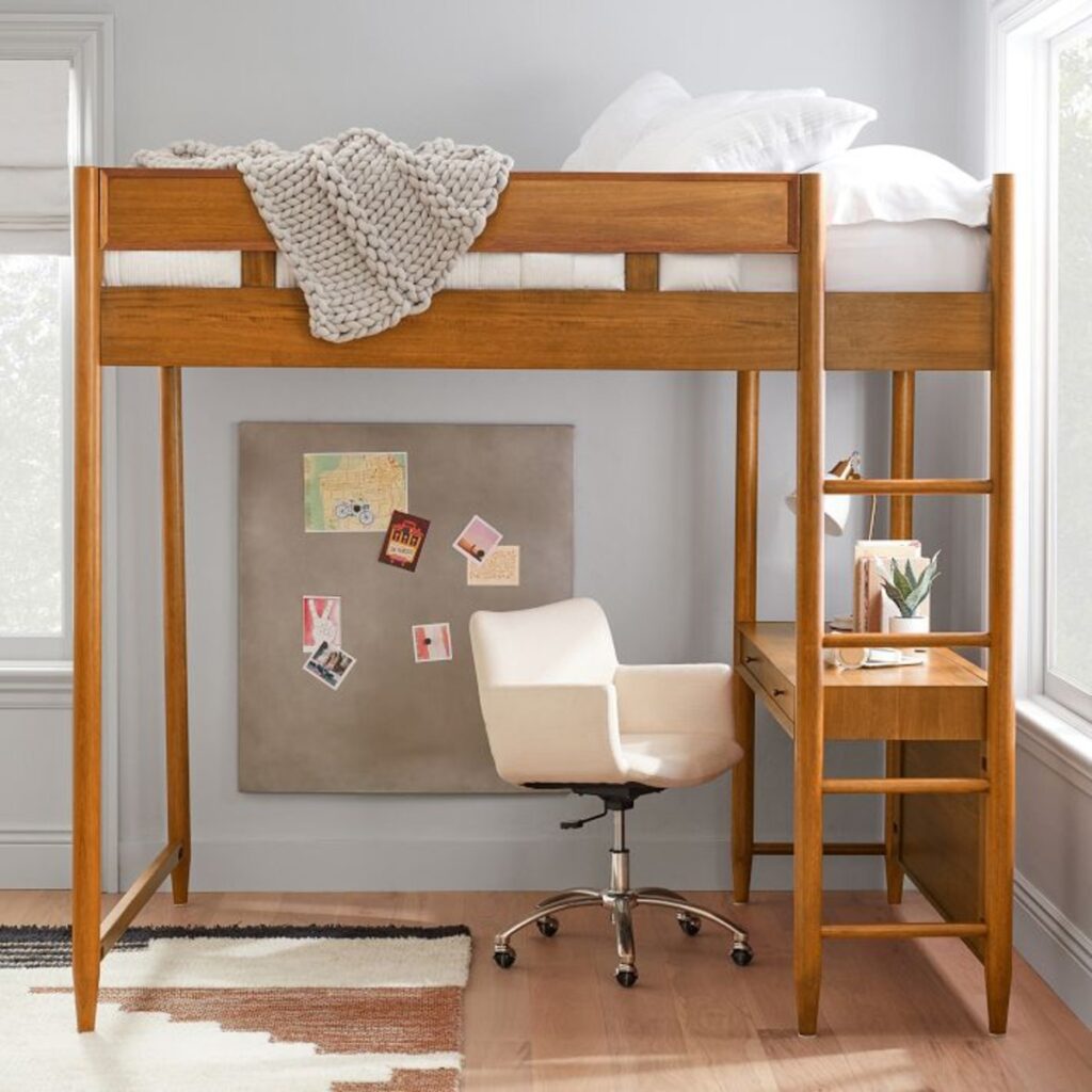 mid century loft bed with rolling chair underneath. 